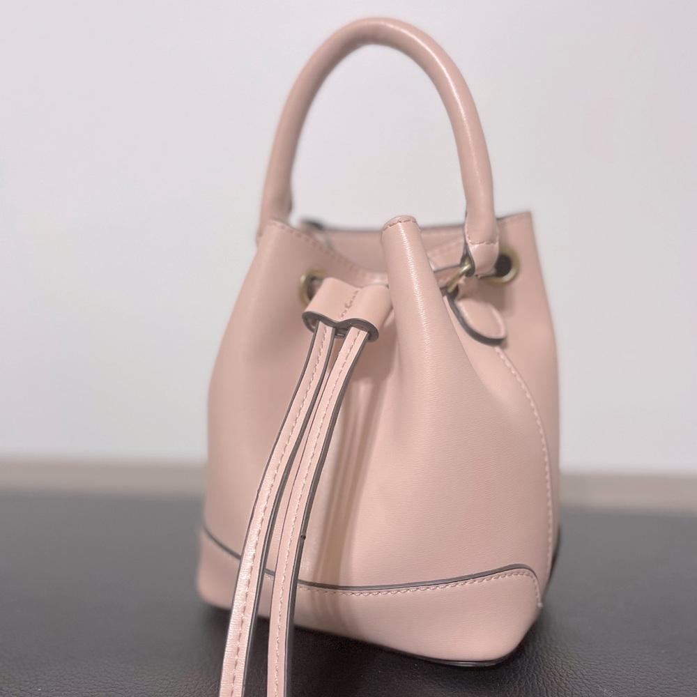 SOLD NWOT MINI BUCKET BAG